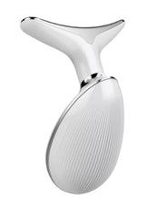 Load image into Gallery viewer, AEROSPACE MD NEFERTITI NECK LIFT DEVICE. Aerospace MD is a carefully curated collection of global skincare tools that have been Aerodynamically, and ergonomically modified by design to best fit the contours and anatomy of the face. The proportions of the facial structures can be measured and applied to include 60–70-degree angulation of skincare tools to best accommodate the angle of the mandible jawline, the zygomatic process of the cheek bones, and all contours and angular facial structures
